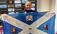 Molly Wright with her specially made flag following Scotland's win over Fiji Flag day for Molly Wright: Scotland star celebrated for 'hard work' and 'enthusiasm'